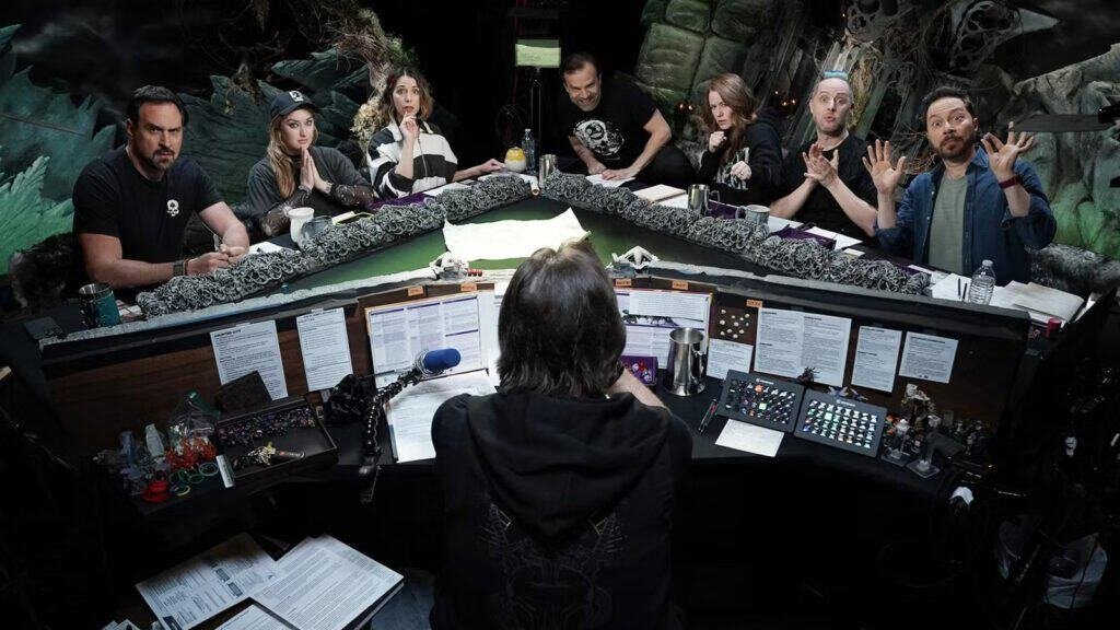 Гравці сидять за столом в настільній рольовій грі